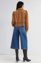 Veste à manches bouffantes avec ourlet Suède