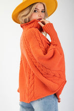 PULL PONCHO EN TRICOT À COL MONTANT